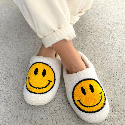 Pantofole con faccina sorridente